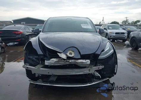 2022 Tesla Model Y Long Range Dual Motor All-Wheel Drive z USA, uszkodzony, nr VIN 7SAYGDEE1NF480815